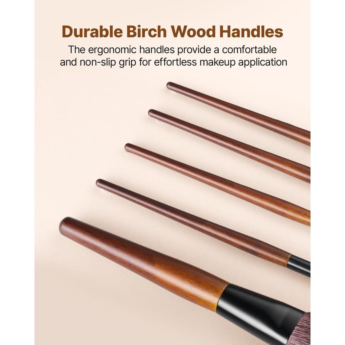 Concealer brush with a sleek aluminum ferrule on a vanity.